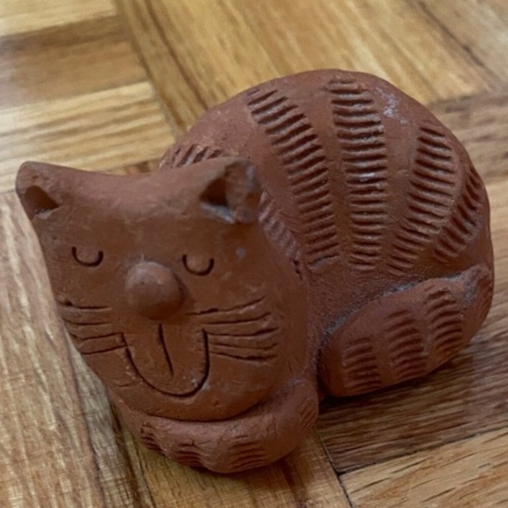 Cute little terra cotta clay small cat kitty figurine